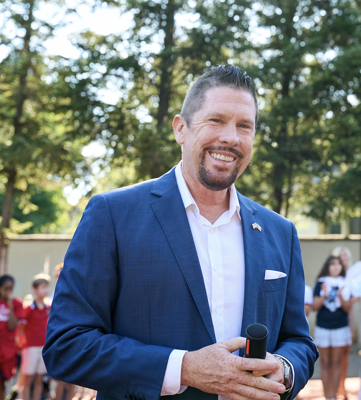 Dr. Matthew D. Wilkens speaking at a school event